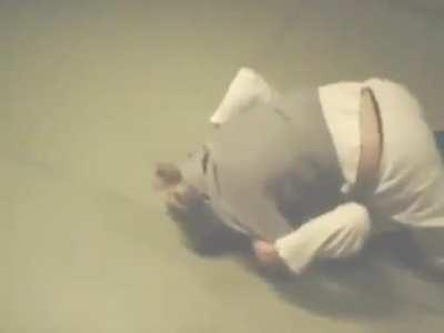 15 year old female Judoka rolling with an adult untrained man because her father said she could beat him and he disagreed