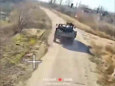 Ukrainian troops in the bed of a moving Unimog truck attempt to engage a fiber optic FPV drone pursuing their vehicle near Kupiansk in March 2025