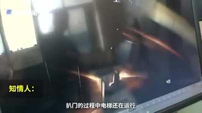 Kid pissed in the elevator's control panel, causing shortcut and was trapped inside