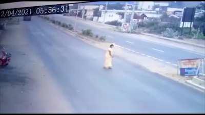 Woman moves into the path of the biker, gets hit by it