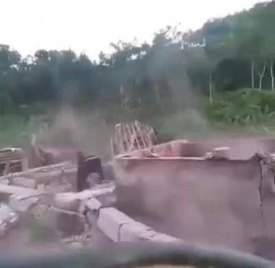 Pretending you're super strong.