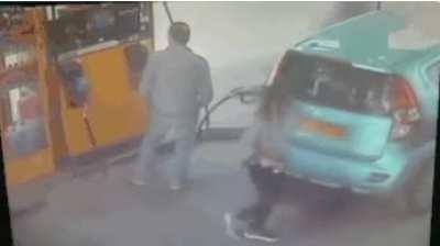 She asks for a ciggie, guy says no, so she lights the nozzle