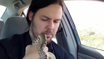 Storm chaser gives water and life advice to snake