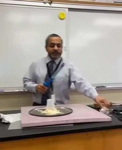 Professor making foil float