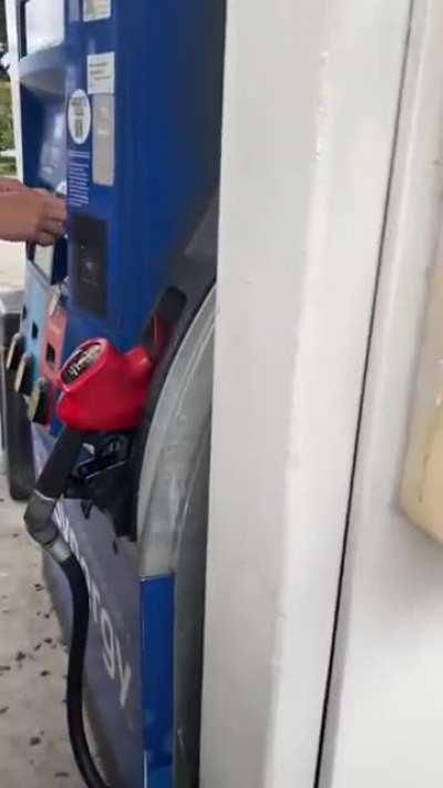 Man finds a card reader on the gas pump.