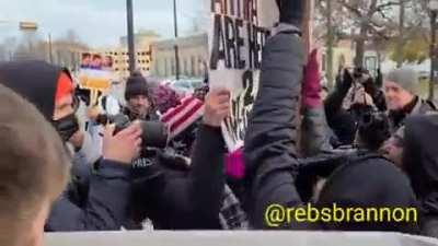 BLM and Antifa intimidate woman with sign that says 