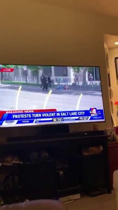 Police in Salt Lake City shove an old man with a cane to the ground