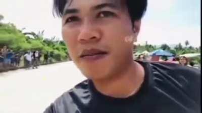 The man mistakenly switched to the front camera and then realize his mistake.