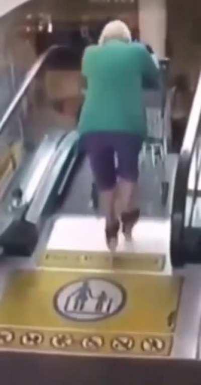 To go down the escalator with a shopping cart