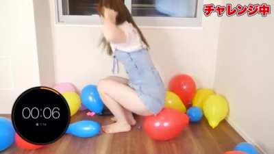 Ai Uehara bursting balloons