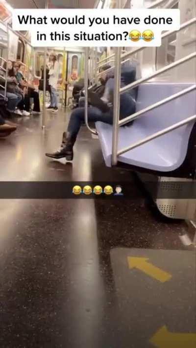 Childish woman hogs seat on NYC Subway
