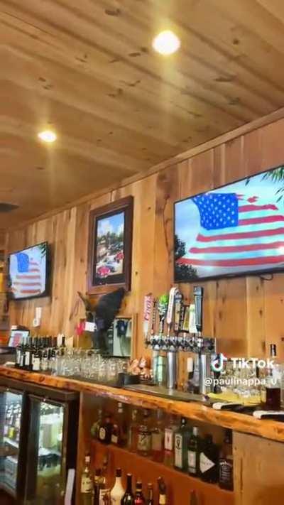 Patrons at restaurant pledge to the red, white and blue mid meal.
