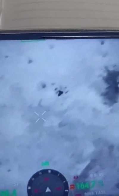 russian drone records Ukrainian hexacopter equipped with a machine gun firing at russian positions