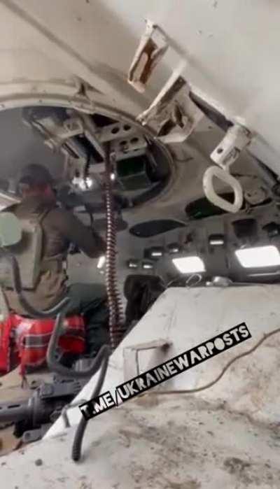 An inside view of a Ukrainian soldier operating a BTR-80 firing at Russian targets in eastern Ukraine.