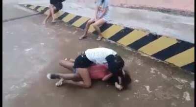 Girl swings first and immediately regrets it.