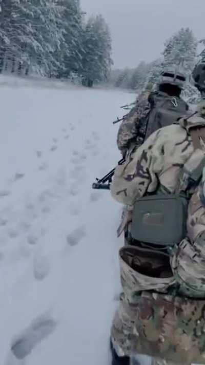 Ukrainian Soldiers geared up while the Russians freeze