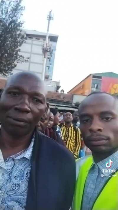 Zambian dude walks up to complete strangers waiting in line and just