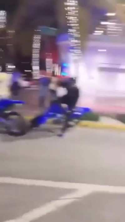 Guy trying to bike his way out of an arrest