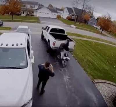 Loading his bike on the truck