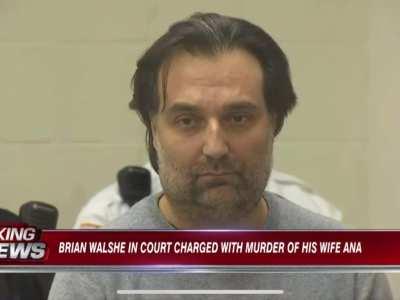 A man charged with murder looks on while his Google searches from the day his wife disappeared are read in court