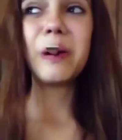 Poor kid gets a spoon stuck in her mouth