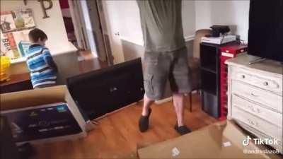 Parents shocked and do nothing when their kid with a hammer smashes their new TV