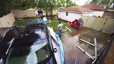 Driver busts into backyard, breaking beyond repair a pool, a trampoline, whatever else was damaged and flooding the whole place.