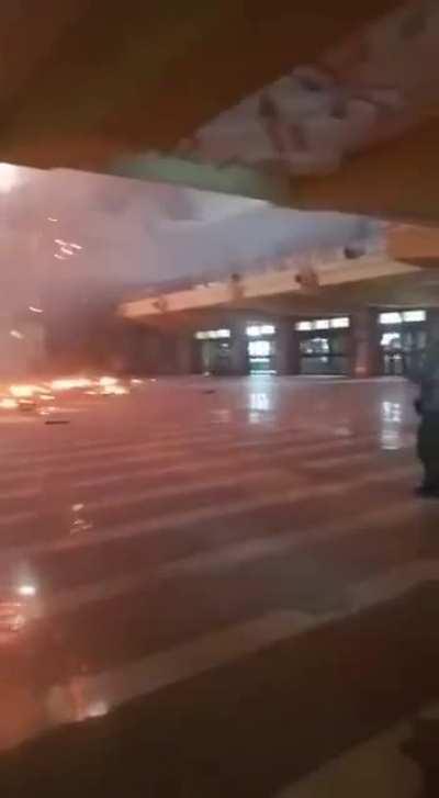 Some guys just chillin' inside a burning building. Jakarta Islamic Center