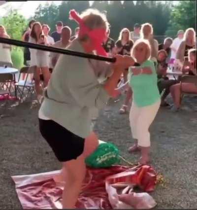 what's wrong with walking in on a blindfolded man ready to swing?