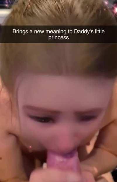 Daddy's little princess doing what she does best.