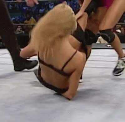 Stacy Keibler getting her sexy ass spank by her BFF Torrie Wilson