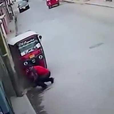 Dog rammed a three-wheeled taxi causing it to crash and fled the scene