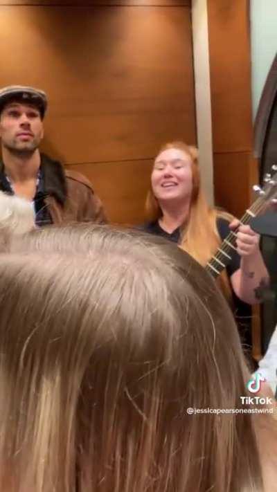 Stuck in an elevator together.