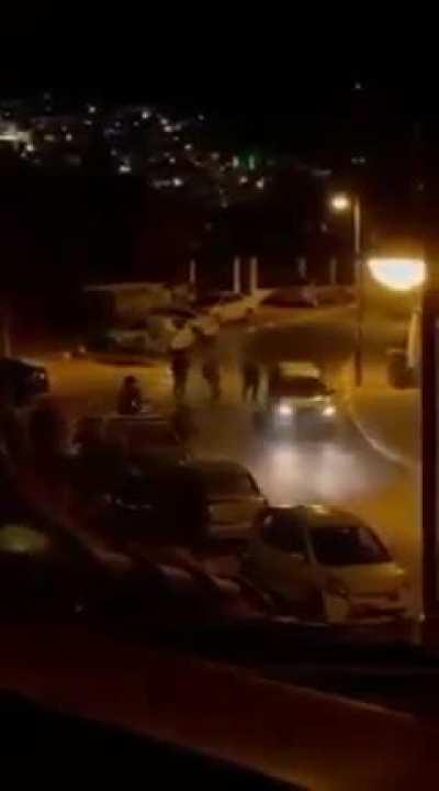 IOF soldiers attacking Palestinian cars in Um Al-Fahem