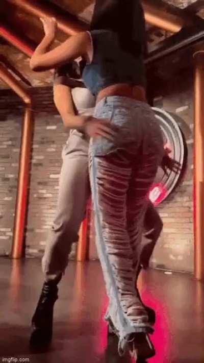 Brie grabbing Nikki's ass