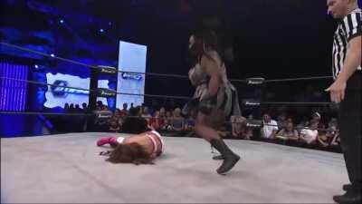 Awesome Kong with devastating choke slam to Brooke Adams