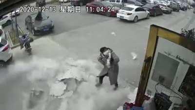 Kind of looks like the heavy wind almost killed that lady