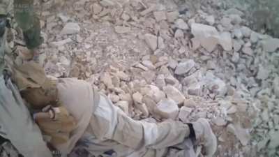 A PMC fighter shoots two wounded Islamic State fighters, and is wounded by a grenade. Syria, 2017