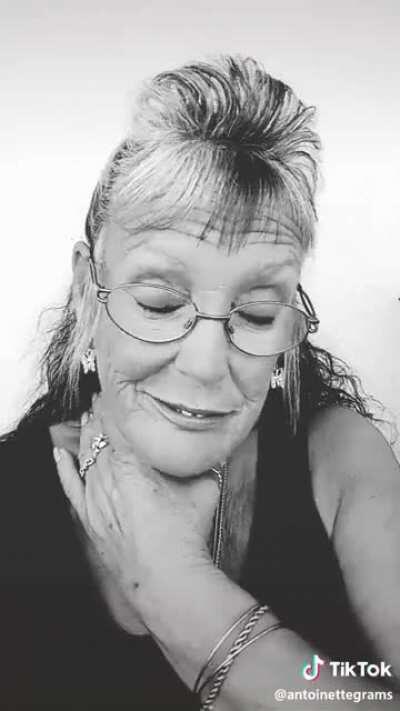 Is that a hickey on her tooth too or does she just need to brush for once