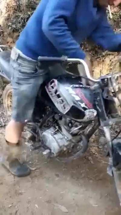 Lighting up his cigarette!