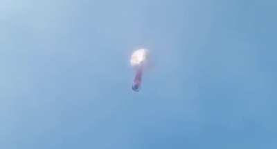 Launching a balloon full of fireworks right above their heads