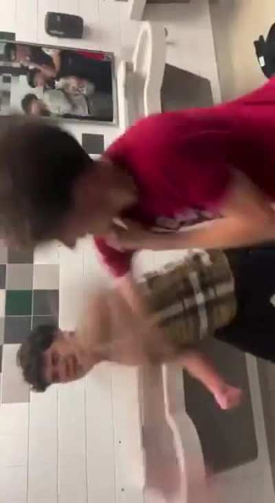 someone pissed in red shirts backpack and the other kid wanted to fight so he said it was him