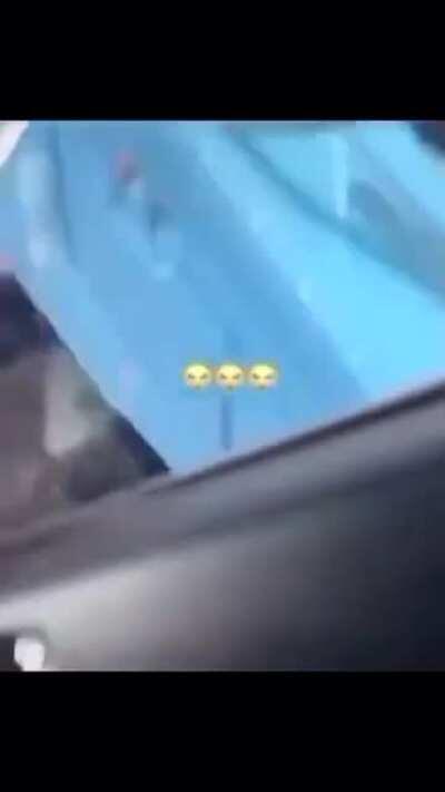 Cool guy tipping over a porta potty