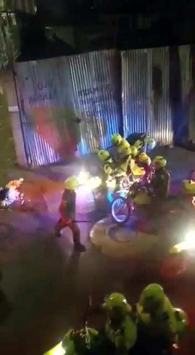 Colombian cops dont play they will chase you and beat you.. this is going on with the riots. Houses are being burned and people are being shot to death as well. Sad