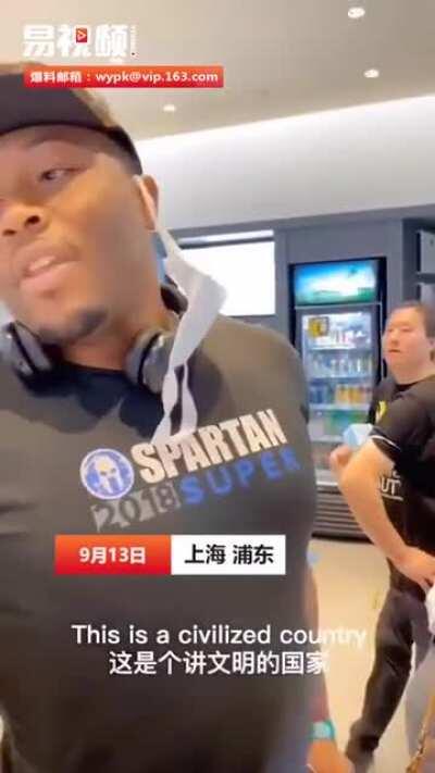 American in China tells a cashier to go back to where she came from