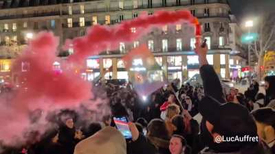 French people celebrating the death of Nazi figurehead of main far right party in Paris