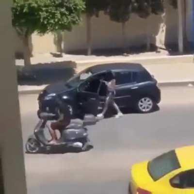 Film dance video in the middle of a street