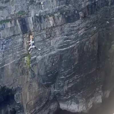 Jumping off a cliff in Scotland