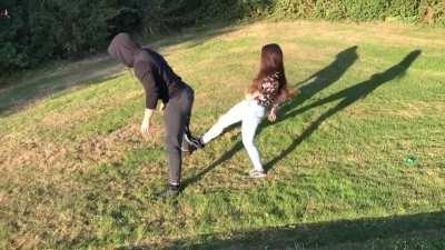 Ballbusting kicks from behind - Amateur video