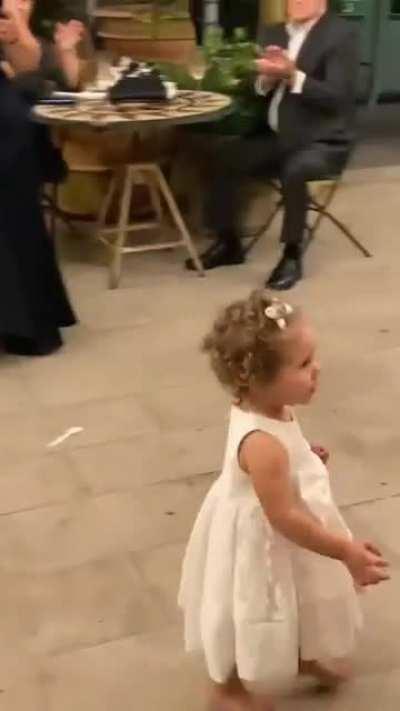 Little girl's reaction to a woman playing the violin is heart melting to watch. Not (OC)